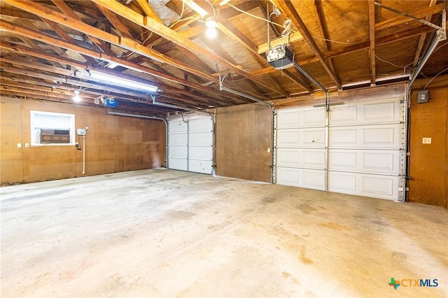 garage featuring a garage door opener