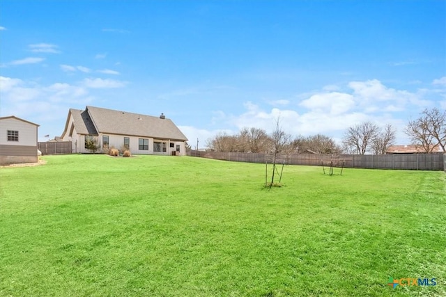 view of yard featuring a fenced backyard