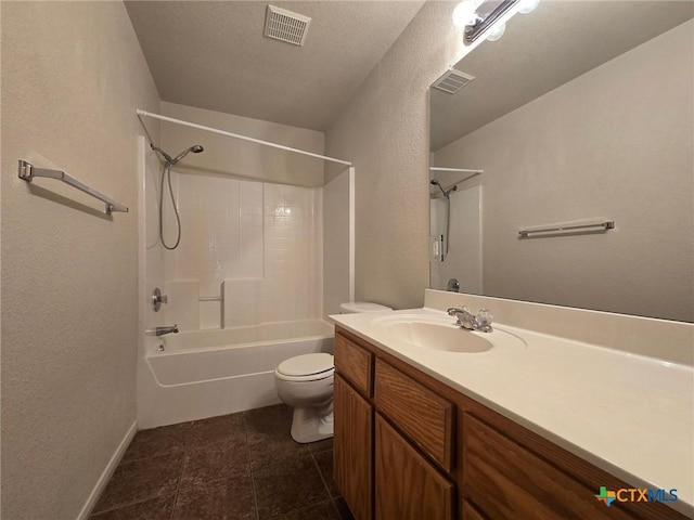 4101 Shasta, Copperas Cove, TX 76522 - bathroom with toilet, vanity, washtub / shower combination, a textured wall, and tile patterned flooring