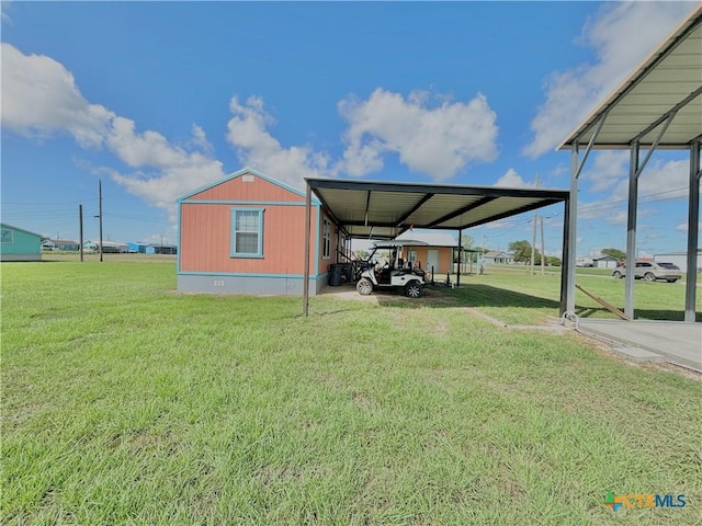 101 N 13th St, Seadrift, TX 77983 - view of parking / parking lot with a carport