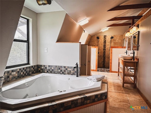 bathroom featuring vanity, separate shower and tub, and vaulted ceiling