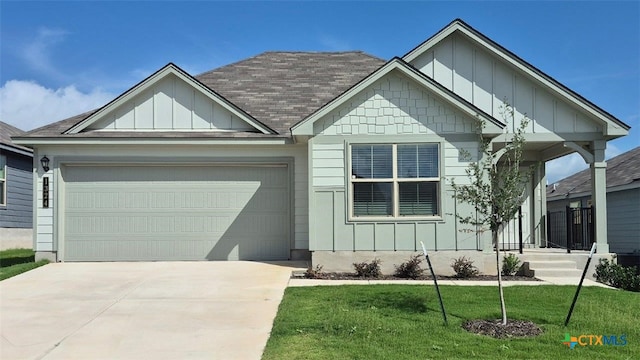 1324 Piedmont St, Temple, TX 76504 - view of front facade with a front yard and a garage