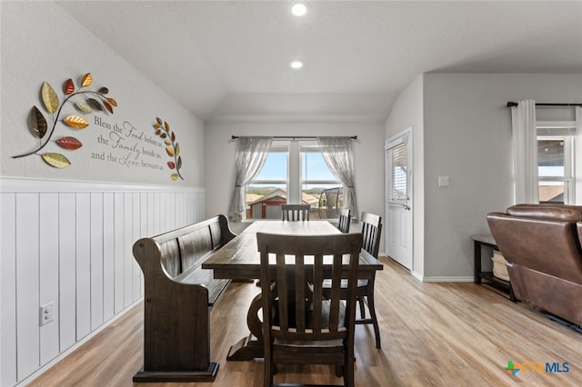 31682 Nimbus Dr, Bulverde, TX 78163 - dining room with light wood-type flooring, a wainscoted wall, recessed lighting, and vaulted ceiling