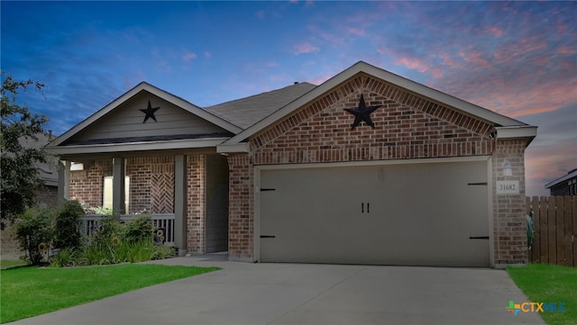 31682 Nimbus Dr, Bulverde, TX 78163 - ranch-style house with brick siding, an attached garage, and driveway