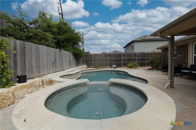 2711 Curtis Dr, Copperas Cove, TX 76522 - view of pool featuring a patio, a fenced backyard, and a pool with connected hot tub