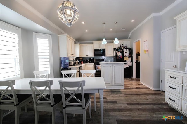 2711 Curtis Dr, Copperas Cove, TX 76522 - dining room featuring recessed lighting, dark wood-style floors, crown molding, and a chandelier