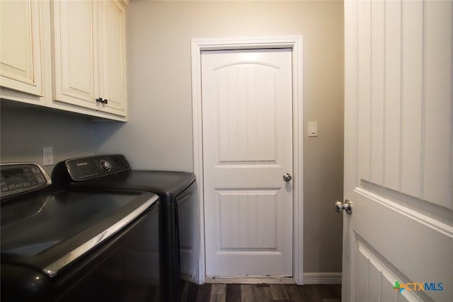 2711 Curtis Dr, Copperas Cove, TX 76522 - laundry area with washing machine and clothes dryer, cabinet space, and dark wood-type flooring