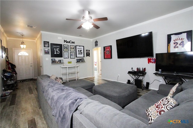 2711 Curtis Dr, Copperas Cove, TX 76522 - living room with wood finished floors, a ceiling fan, and ornamental molding