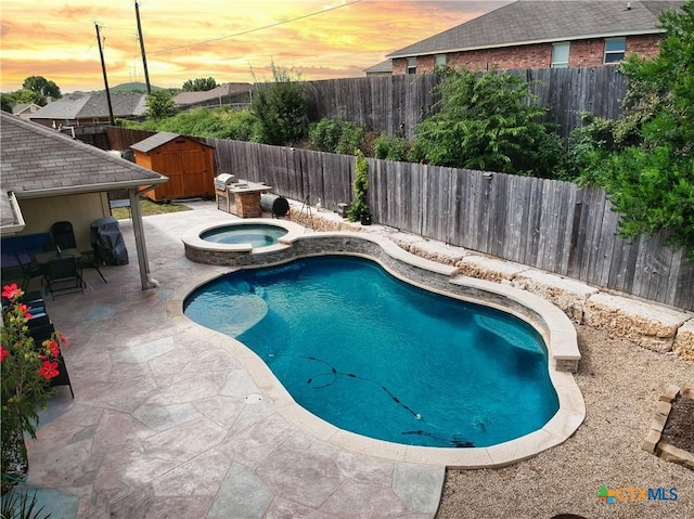 2711 Curtis Dr, Copperas Cove, TX 76522 - view of swimming pool with a patio, a storage unit, and a fenced backyard