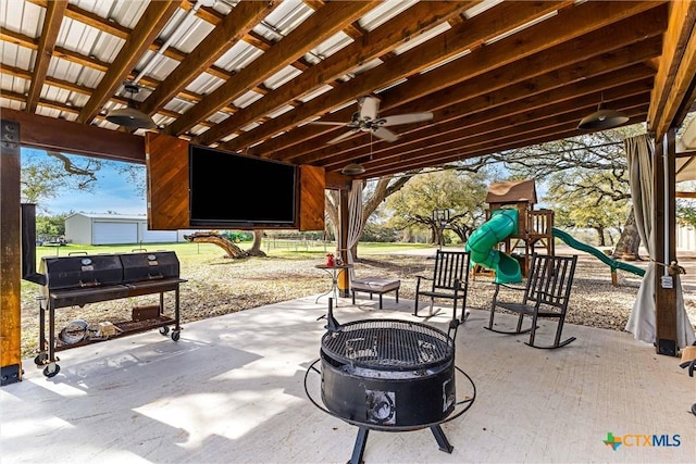 13755 N Lone Star Pkwy, Valley Mills, TX 76689 - view of patio with ceiling fan, a playground, and a fire pit