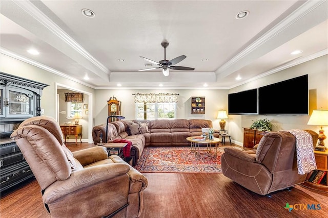 13755 N Lone Star Pkwy, Valley Mills, TX 76689 - living room with a tray ceiling, wood finished floors, baseboards, and ceiling fan