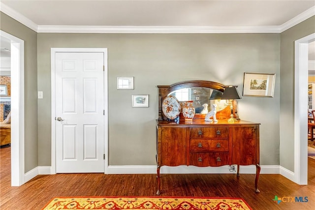 13755 N Lone Star Pkwy, Valley Mills, TX 76689 - entrance foyer with baseboards, ornamental molding, and wood finished floors