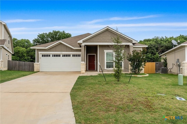 372 Poplin Ln, Troy, TX 76579 - view of front of property with a garage, board and batten siding, central air condition unit, and concrete driveway