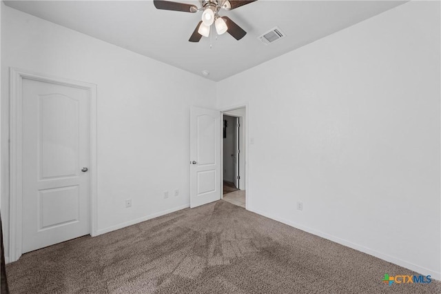 372 Poplin Ln, Troy, TX 76579 - spare room featuring carpet flooring, ceiling fan, and baseboards