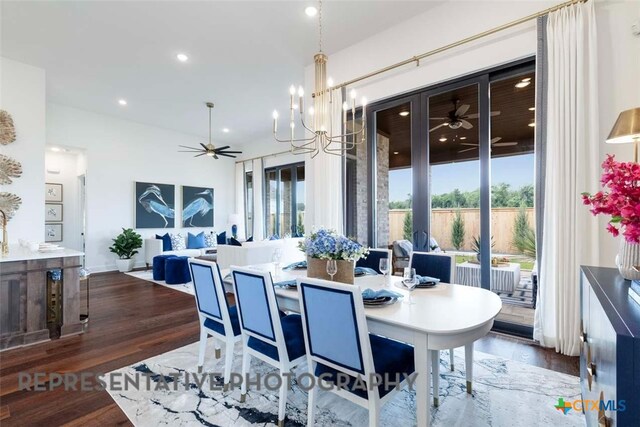 435 Nash Way, New Braunfels, TX 78130 - dining space featuring ceiling fan with notable chandelier and hardwood / wood-style flooring