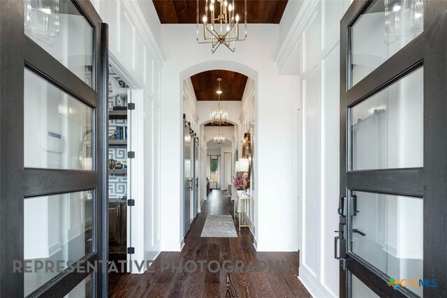 435 Nash Way, New Braunfels, TX 78130 - corridor featuring dark wood-type flooring and wood ceiling