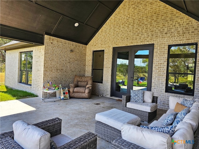 view of patio / terrace featuring french doors and an outdoor living space