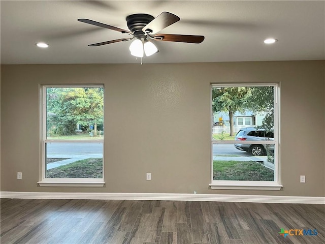 1008 E College St, Seguin, TX 78155 - spare room featuring healthy amount of natural light, wood finished floors, ceiling fan, and recessed lighting