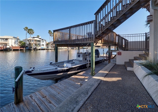 dock area featuring a water view