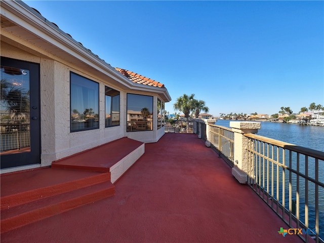 view of patio / terrace featuring a water view