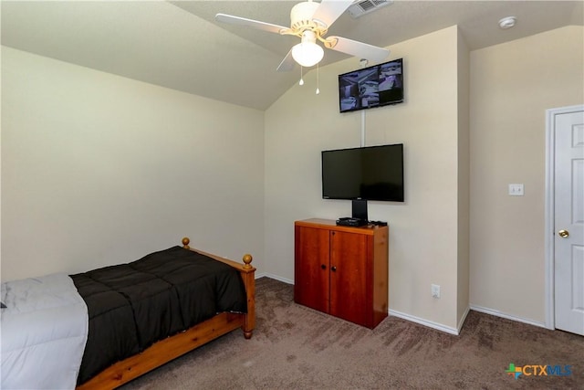 carpeted bedroom with lofted ceiling, baseboards, visible vents, and a ceiling fan