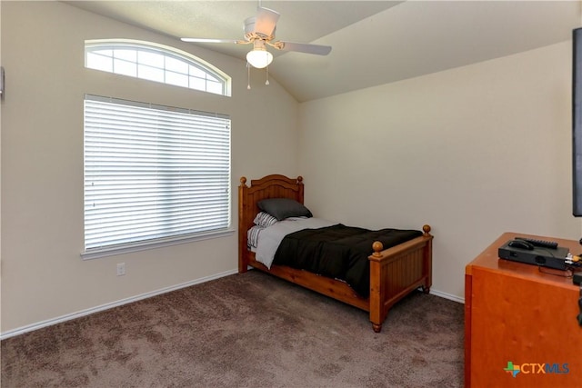 bedroom with light carpet, baseboards, lofted ceiling, and ceiling fan