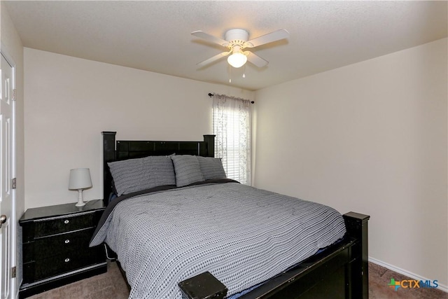 bedroom featuring carpet and a ceiling fan
