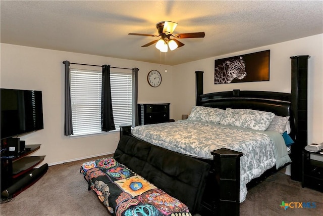 carpeted bedroom with baseboards and ceiling fan