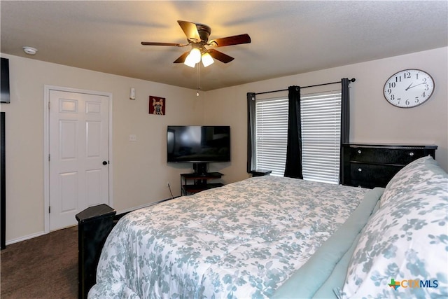 2100 Golden Eagle Dr, Killeen, TX 76549 - bedroom with dark carpet and ceiling fan
