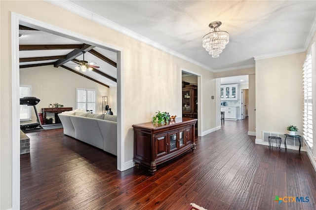 hall featuring dark hardwood / wood-style floors, crown molding, lofted ceiling with beams, and a notable chandelier