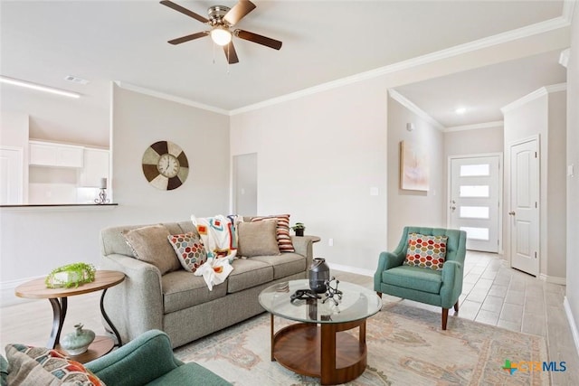 living room featuring ceiling fan and crown molding