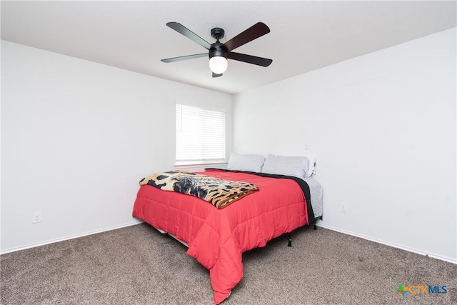 bedroom with ceiling fan and carpet