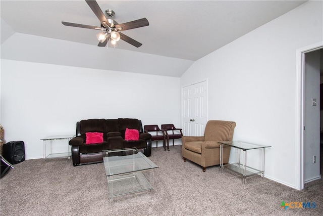 carpeted living room with lofted ceiling and ceiling fan