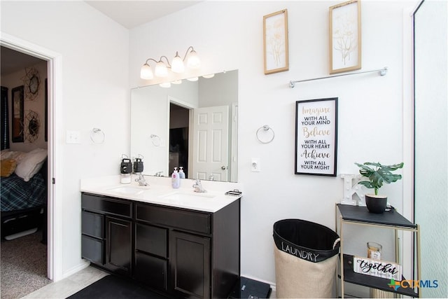 bathroom with vanity and tile patterned floors