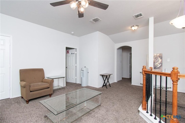 sitting room with ceiling fan and carpet floors