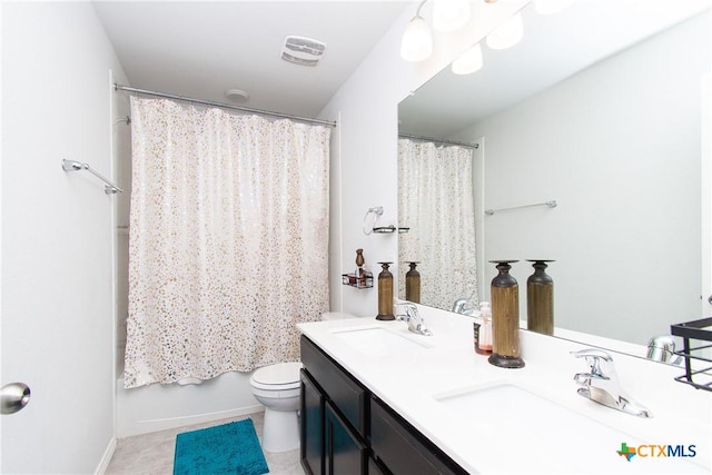 full bathroom featuring toilet, tile patterned flooring, shower / tub combo, and vanity