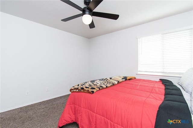 bedroom with ceiling fan and carpet flooring