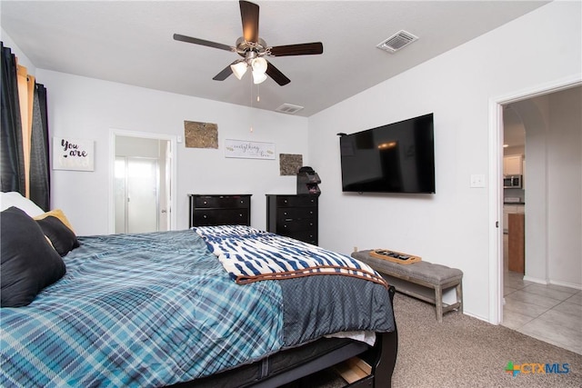 carpeted bedroom featuring ceiling fan