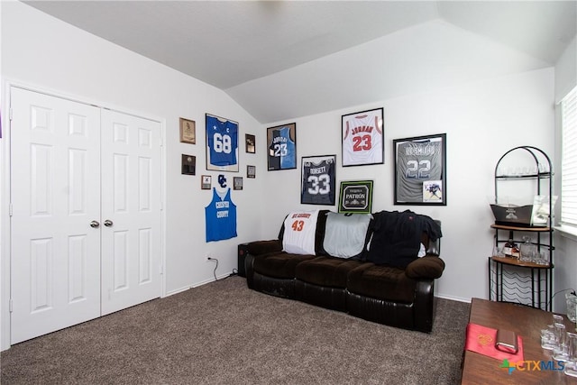 living room with lofted ceiling and carpet flooring