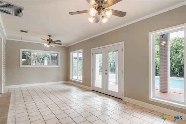 1223 N Sarah Dewitt Dr, Gonzales, TX 78629 - spare room featuring ornamental molding, baseboards, ceiling fan, and plenty of natural light