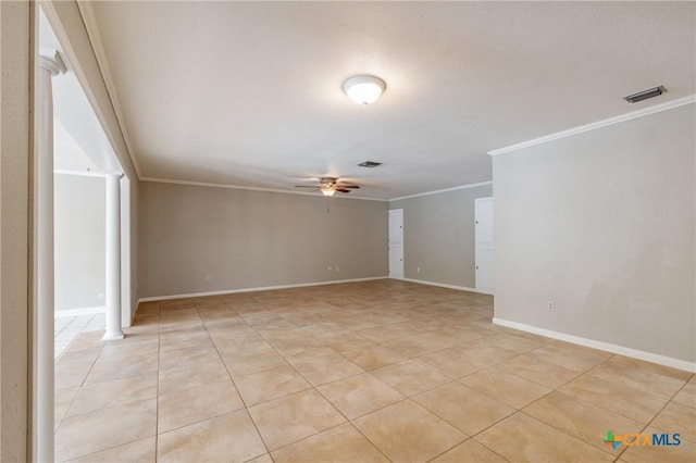 1223 N Sarah Dewitt Dr, Gonzales, TX 78629 - unfurnished room with a ceiling fan, crown molding, light tile patterned floors, and baseboards