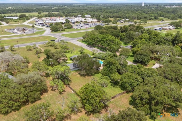 1223 N Sarah Dewitt Dr, Gonzales, TX 78629 - aerial overview of property's location with a forest