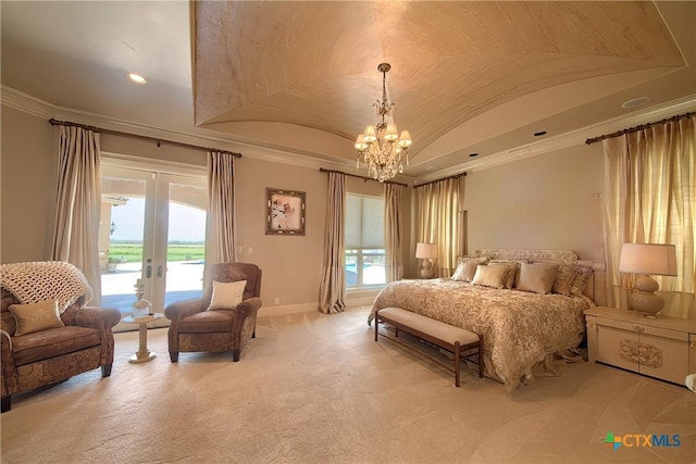 bedroom with vaulted ceiling, access to outside, multiple windows, and baseboards