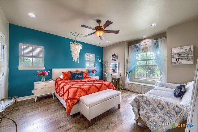 bedroom with baseboards, ceiling fan, wood finished floors, and recessed lighting