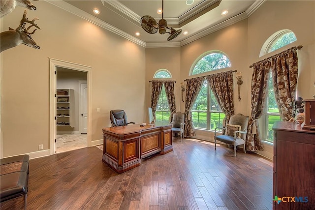 office space featuring baseboards, ornamental molding, dark wood finished floors, and recessed lighting