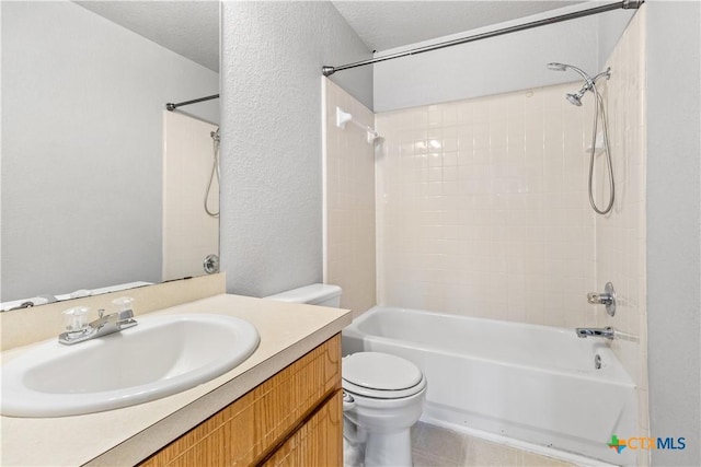 bathroom with bathing tub / shower combination, a textured wall, toilet, a textured ceiling, and vanity