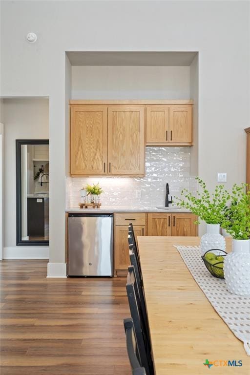 200 County Road 246, Florence, TX 76527 - kitchen featuring stainless steel dishwasher, light brown cabinets, light countertops, and decorative backsplash