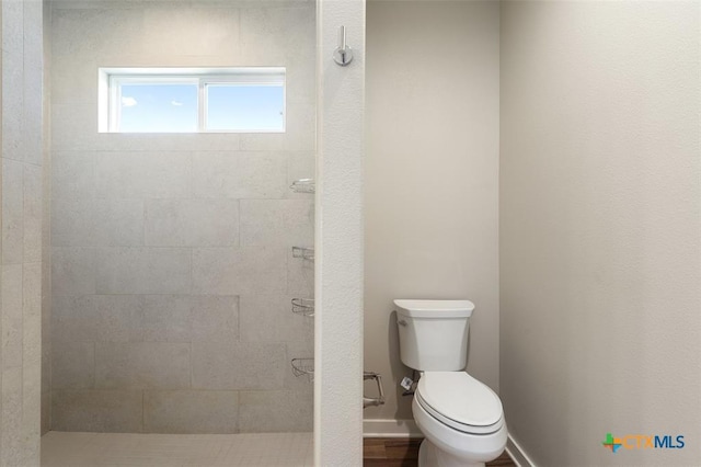 200 County Road 246, Florence, TX 76527 - full bath featuring a tile shower and toilet