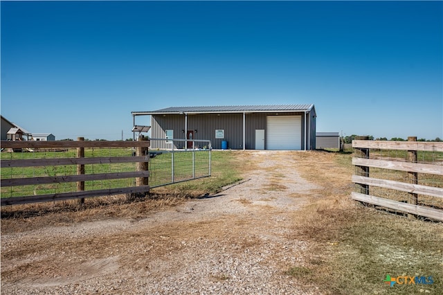 exterior space with a garage