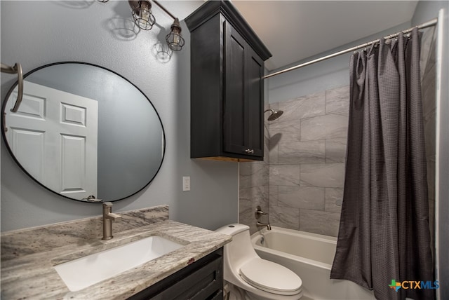 full bathroom featuring vanity, toilet, and shower / tub combo